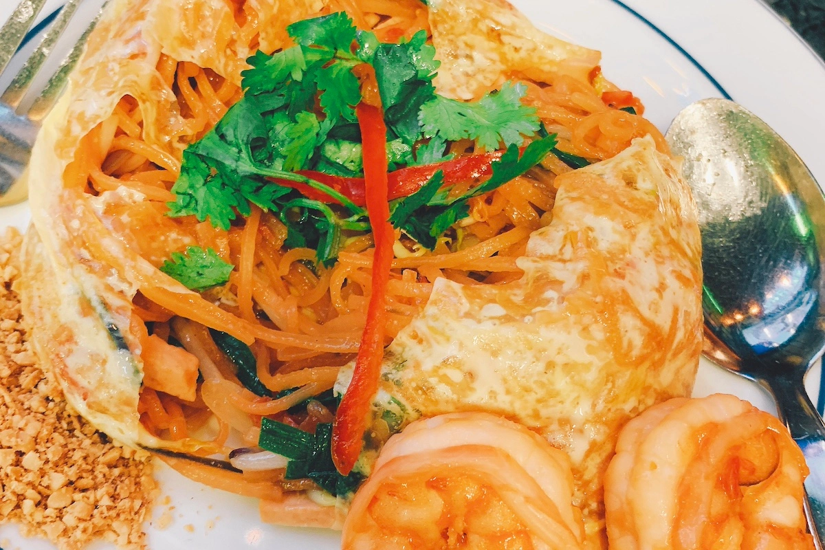 Pad Thai wrapped in egg with fresh shrimp of famous restaurant in Thailand named Thipsamai